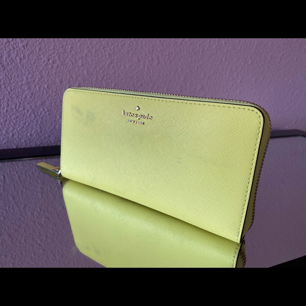Kate Spade Laurel Way Neda wallet in “limelight”